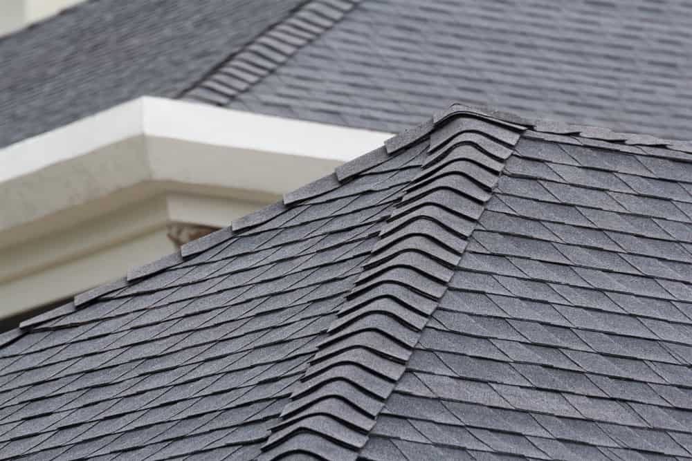 Edge Of Roof Shingles On Top Of A House